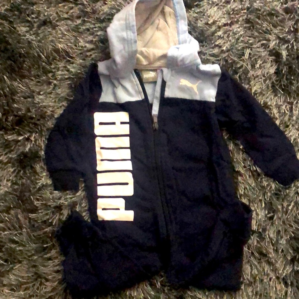 Puma onesie.